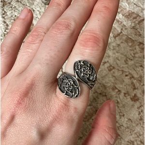 Sterling silver ring with flower detail.